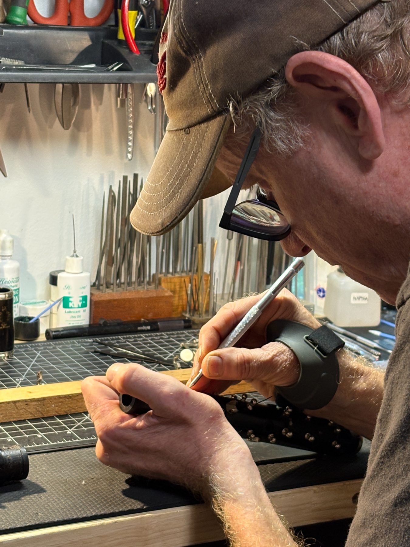 Chris Iatesta working on a clarinet joint at his workbench